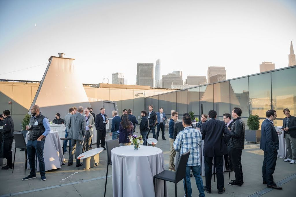 Exploratorium rooftop networking — San Francisco skyline